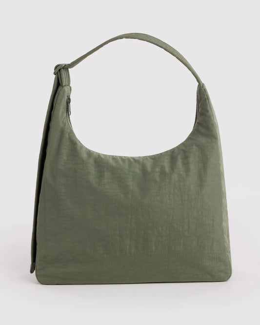 Green handbag on a light gray background