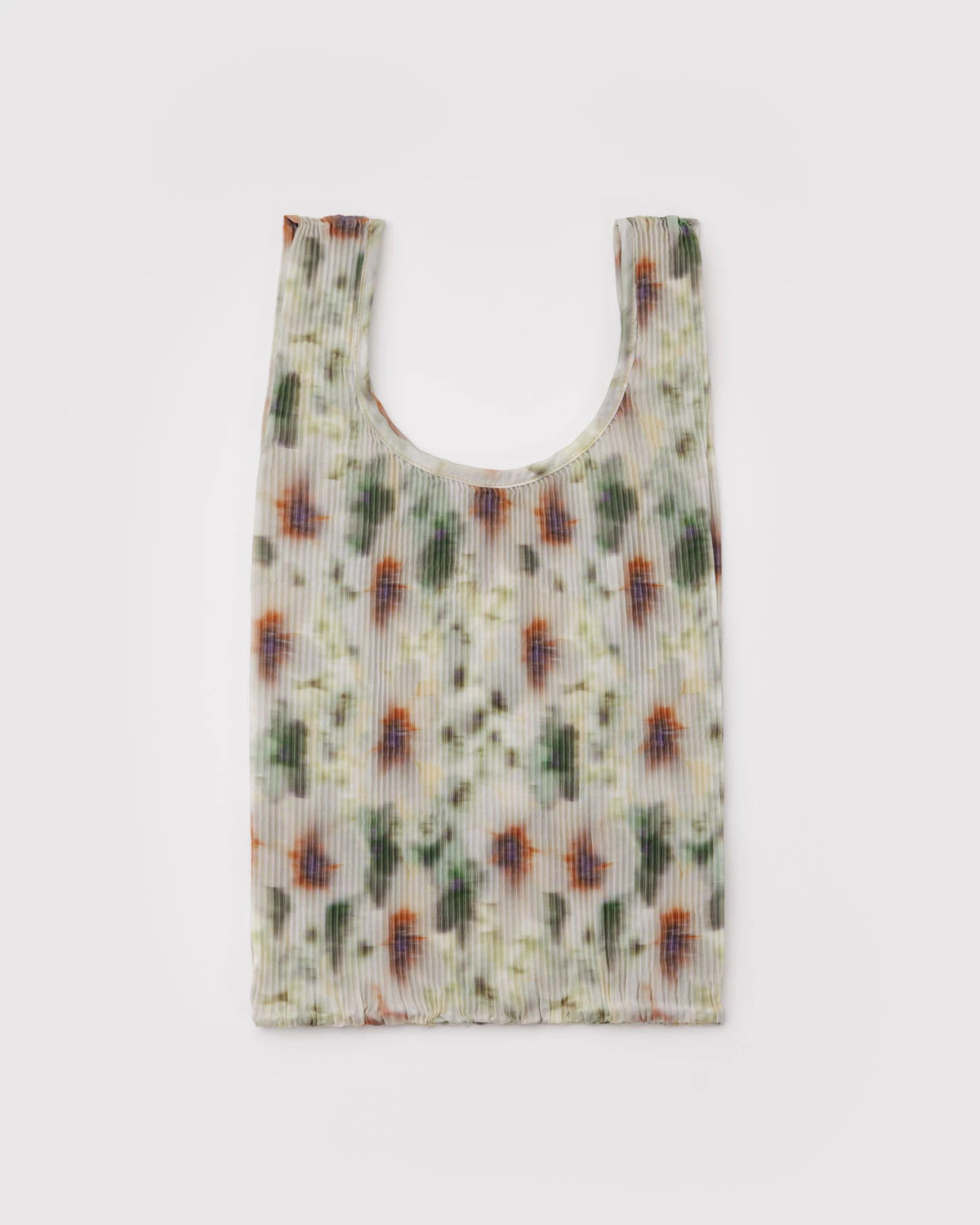 Reusable shopping bag with a floral pattern on a white background