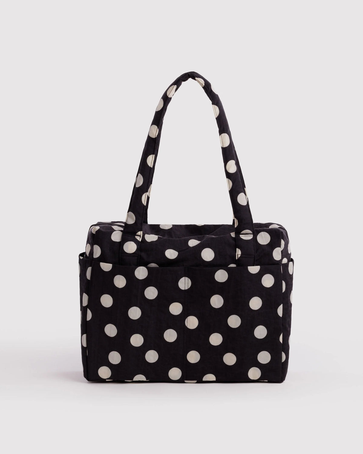 BAGGU Small Cloud Carry-On in Black and Cream Polka Dot pattern on a white background