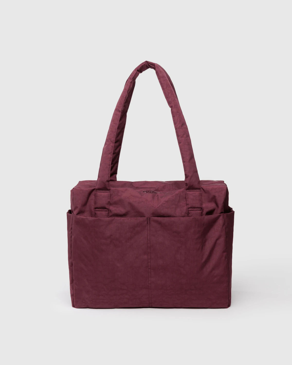 Maroon tote bag on a light gray background