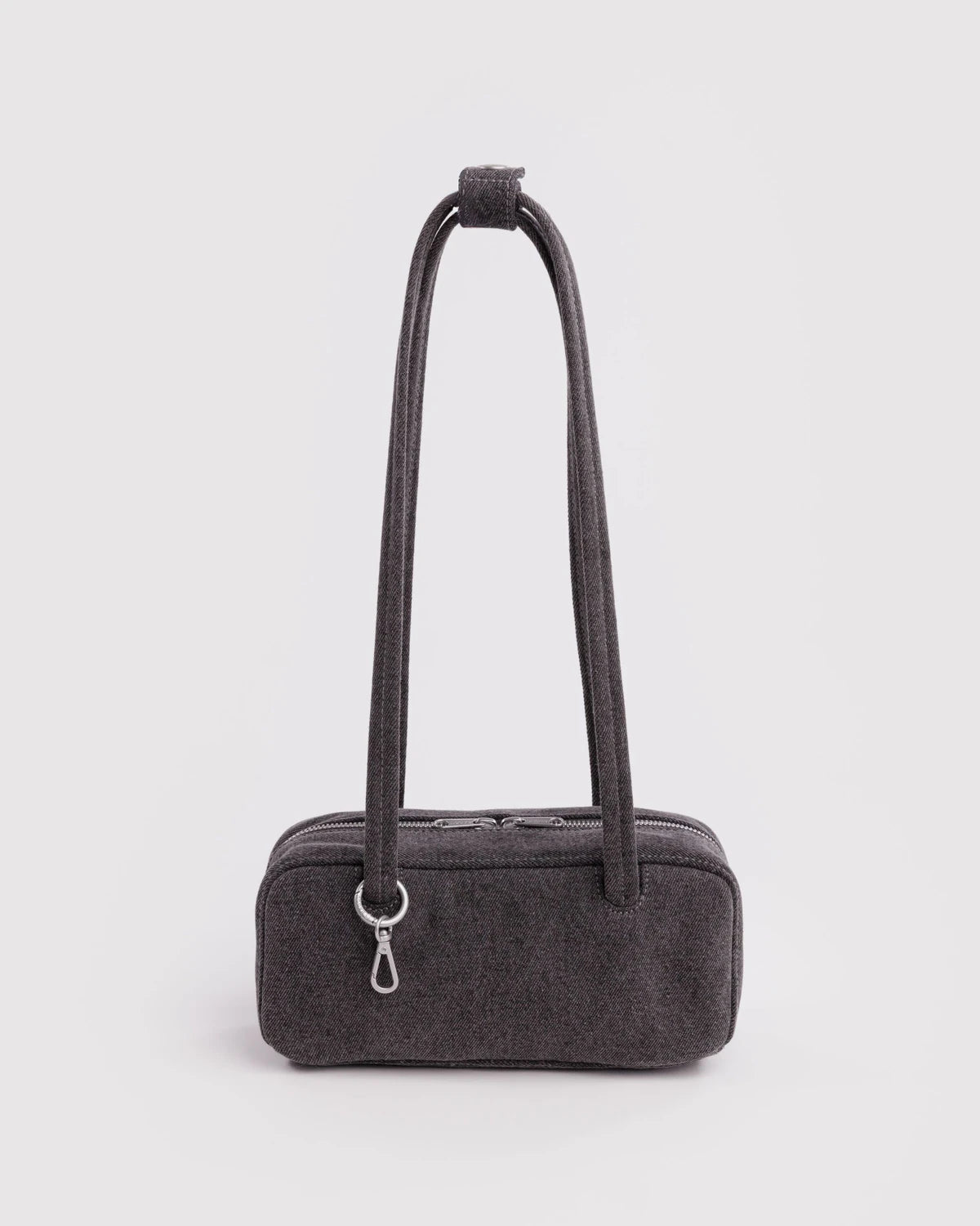 BAGGU Small Denim Bowler Bag in Washed Black Denim on a grey background 