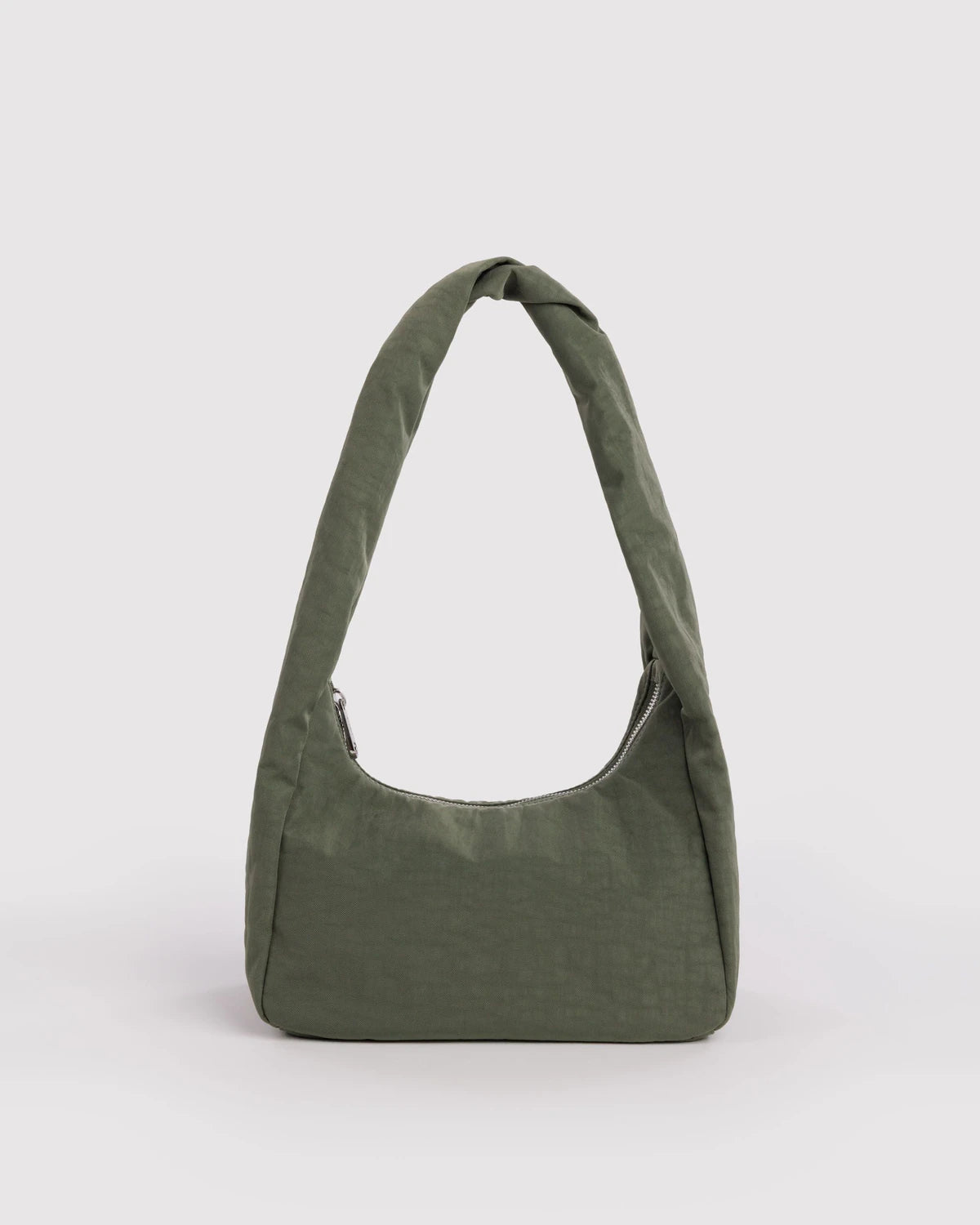 Green shoulder bag on a light gray background