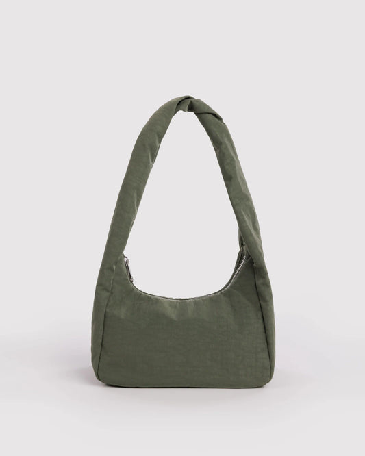 Green shoulder bag on a light gray background