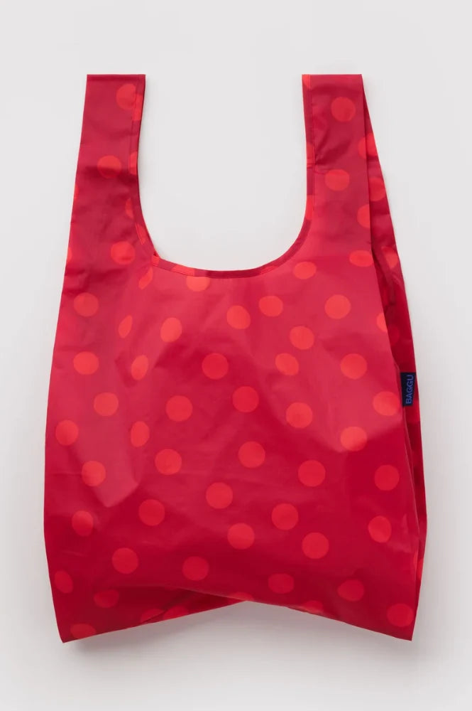 BAGGU Standard Reusable Bag in Red Polka Dot design on a grey background 