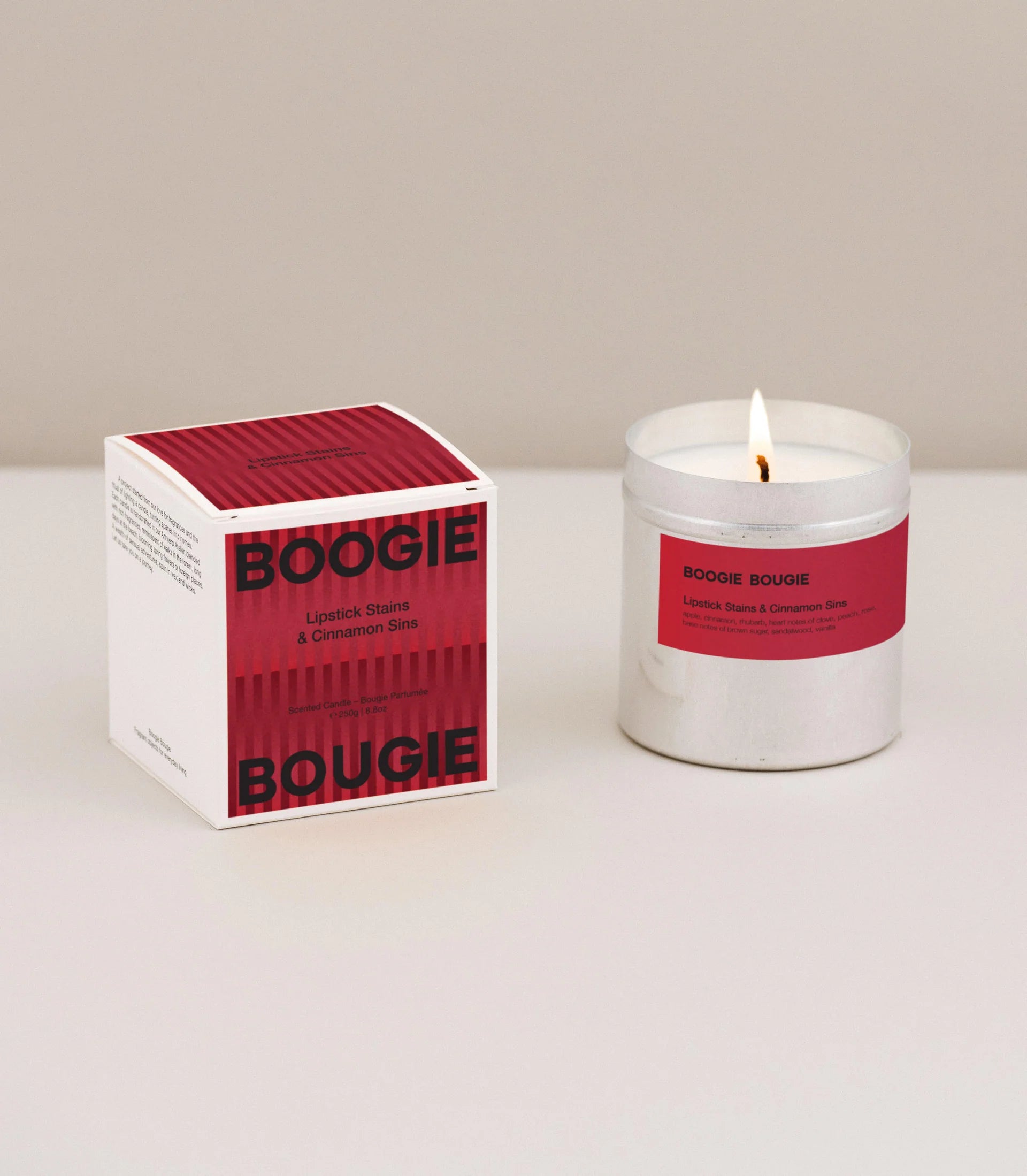 Boogie Bougie Lipstick Stains & Cinnamon Sins Candle on a beige background