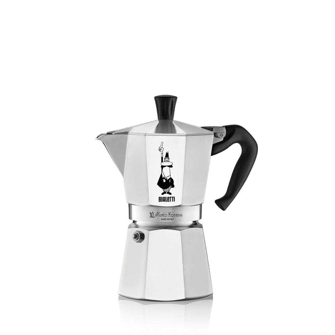 Stainless steel espresso maker with black handle on a white background