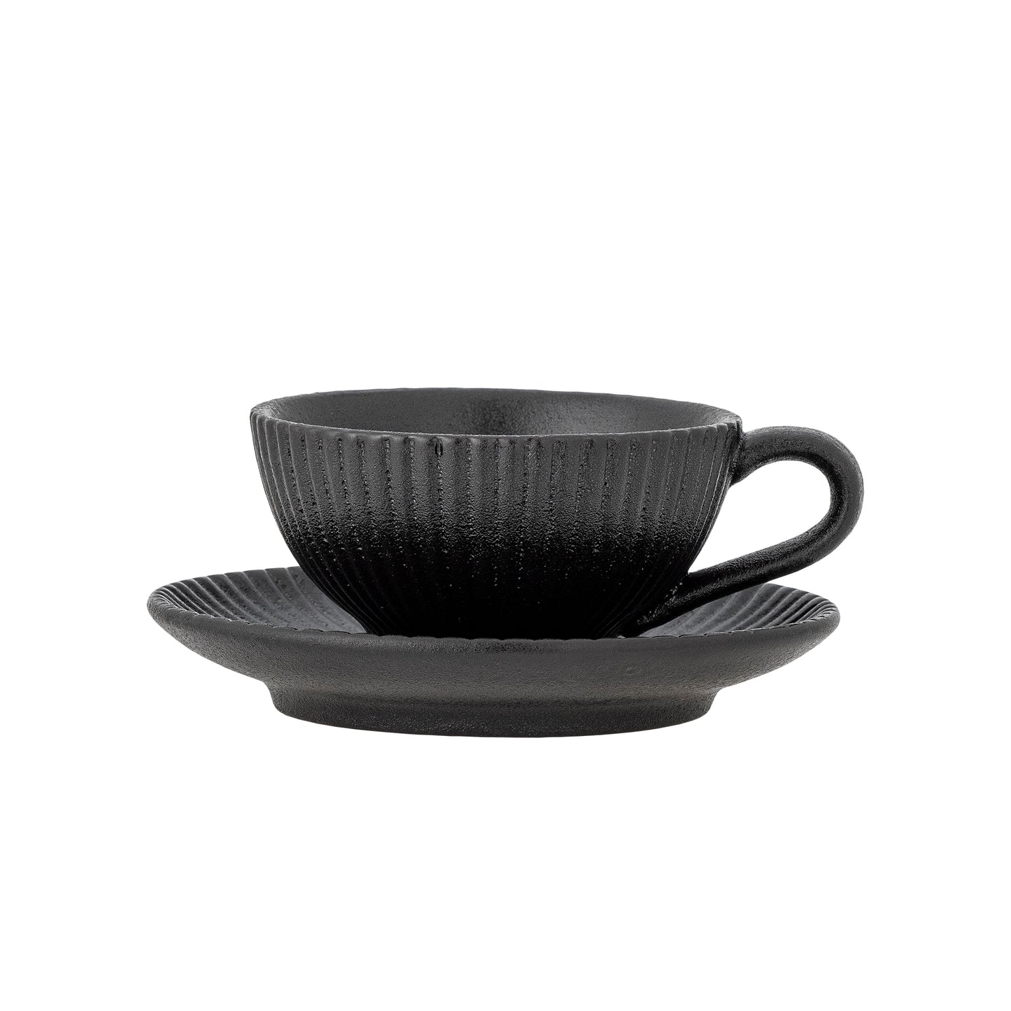 Black ceramic cup and saucer set on a white background