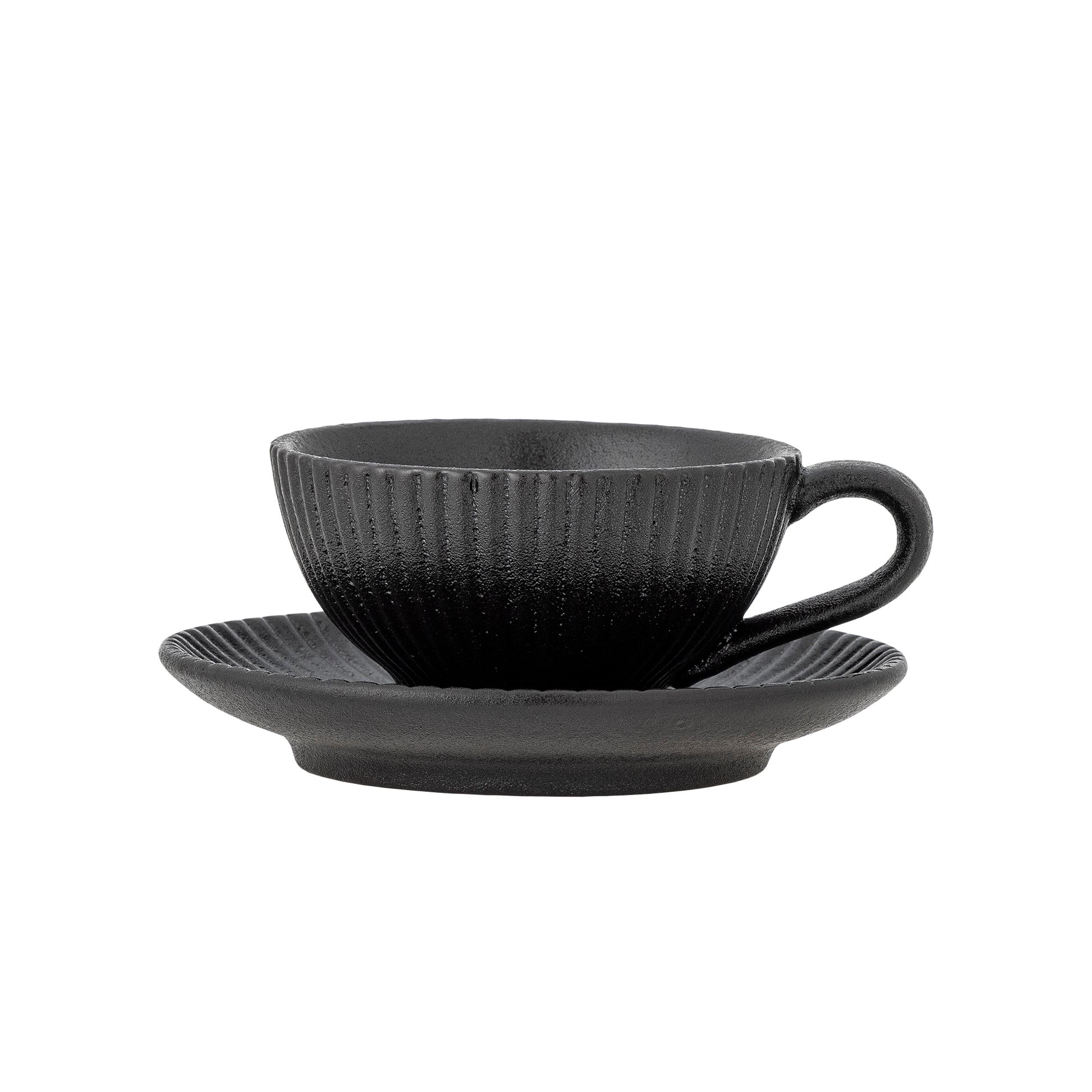Black ceramic cup and saucer set on a white background