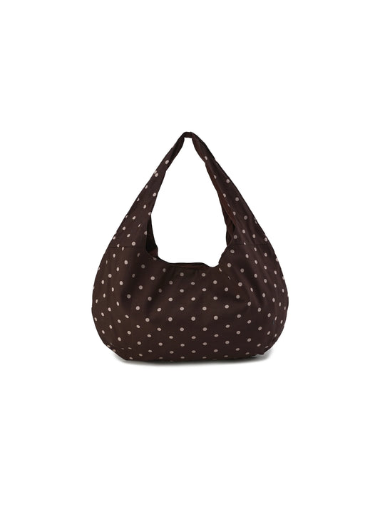 Brown polka dot bag on a white background