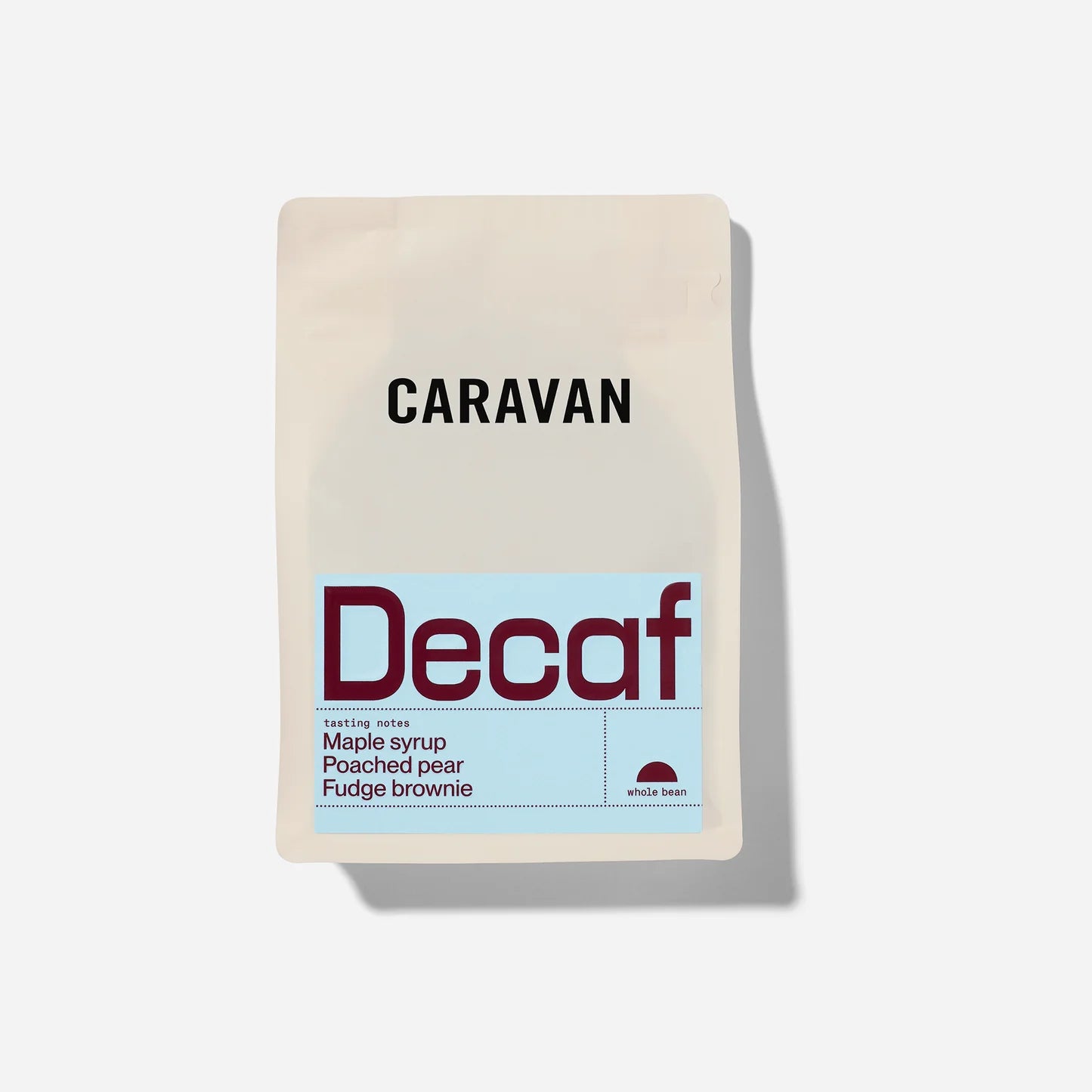 Caravan Roastery DECAF Bag of  Beans on a greay background 