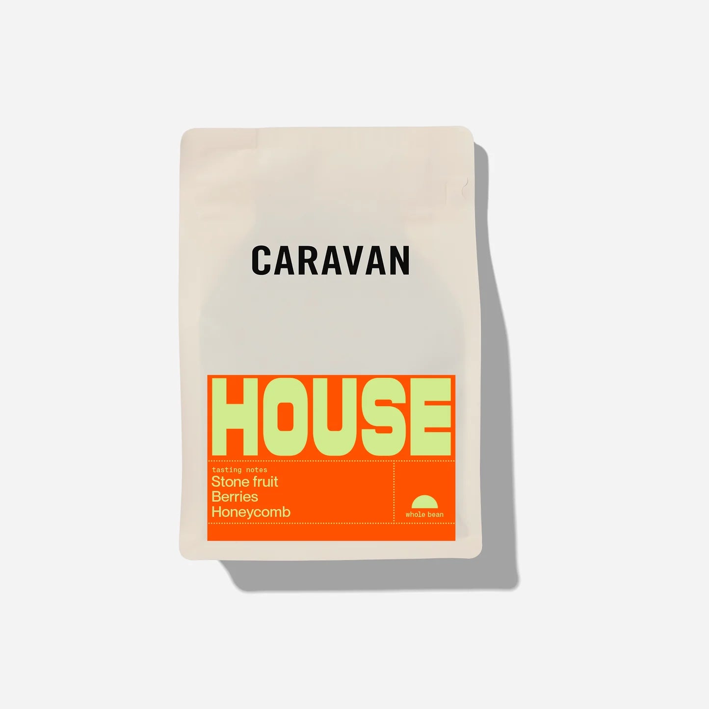 Caravan Roastery HOUSE Beans in a cream bag with large logos on a white background 