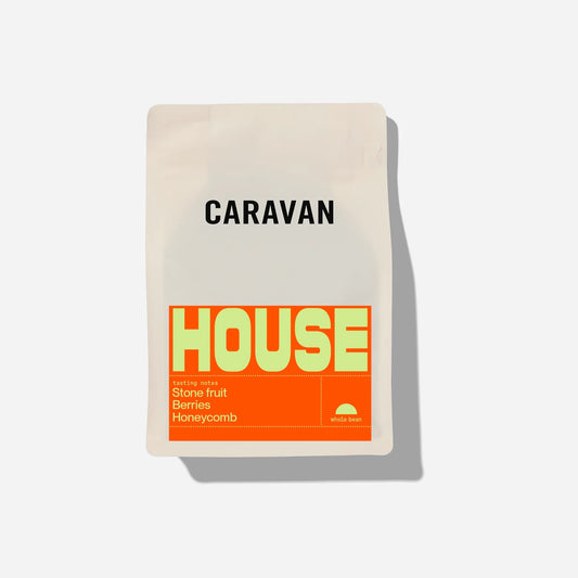 Caravan Roastery HOUSE Beans in a cream bag with large logos on a white background 