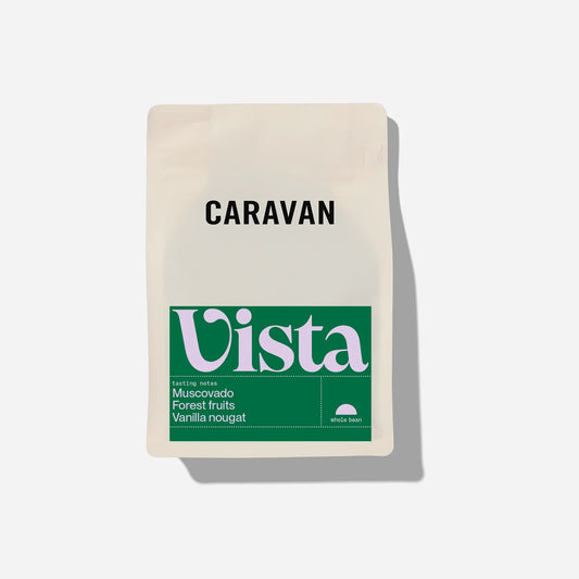 Caravan Roastery VISTA Beans in a cream packaging with green and lilac logo on a white background 