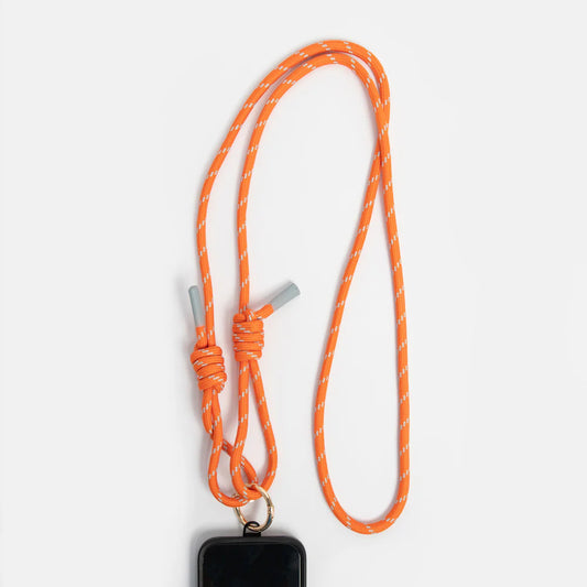 Orange lanyard with a metal clip on a white background