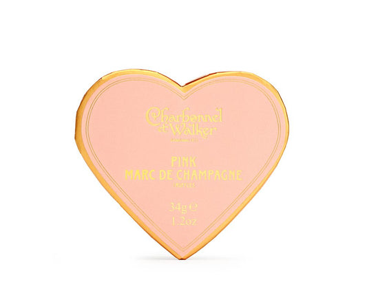 Charbonnel et Walker Truffles in a heart shaped pink box on a white background 