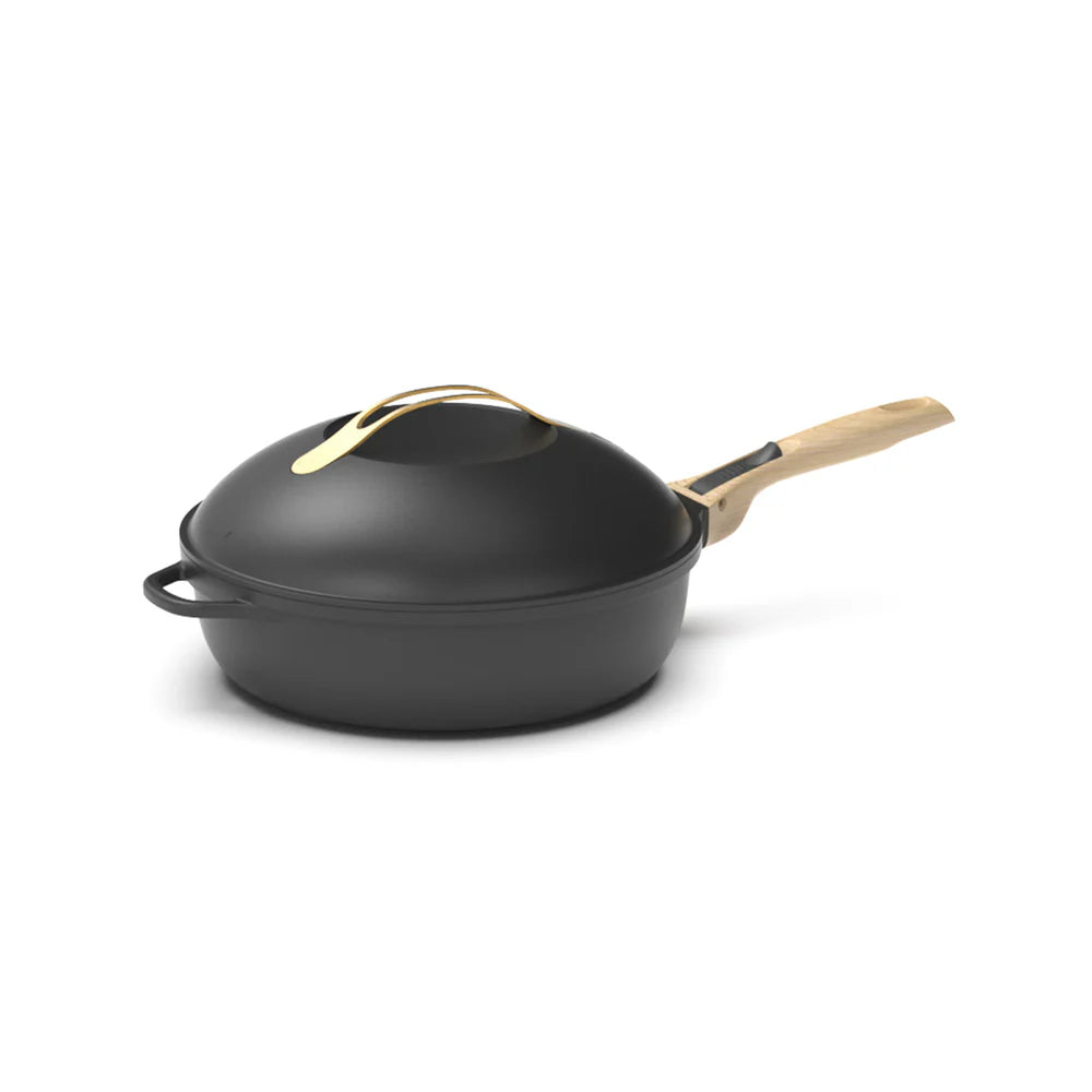 Cookut The Fabulous Pan 28CM in Meteor Black with wooden handle on the side and gold handle on the top of the lid.