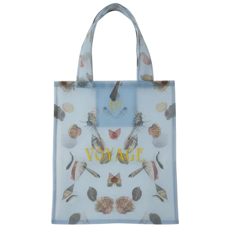 Brigitte Tanaka Coquillage Voyage Organza Bag in light blue mesh material with shell pattern on a white background 