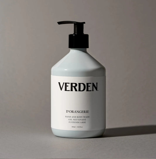 Baby blue bottle with black pump labeled 'VERDEN' on a gray background