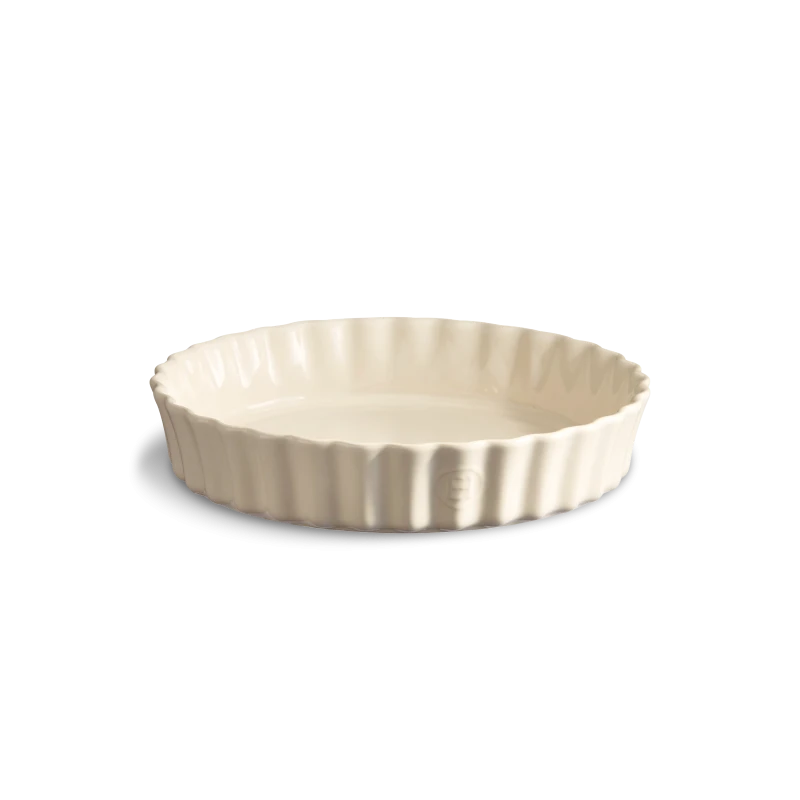 Beige ceramic pie dish on a white background