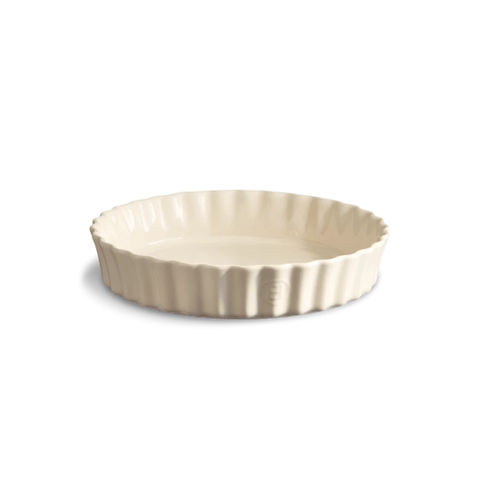 Beige ceramic pie dish on a white background