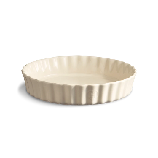 Beige ceramic pie dish on a white background