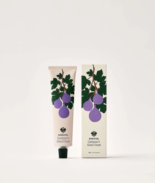 Hand cream with packaging featuring fig design on a white background