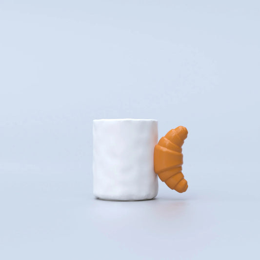 Fluid Market Croissant Mug with a croissant handle 