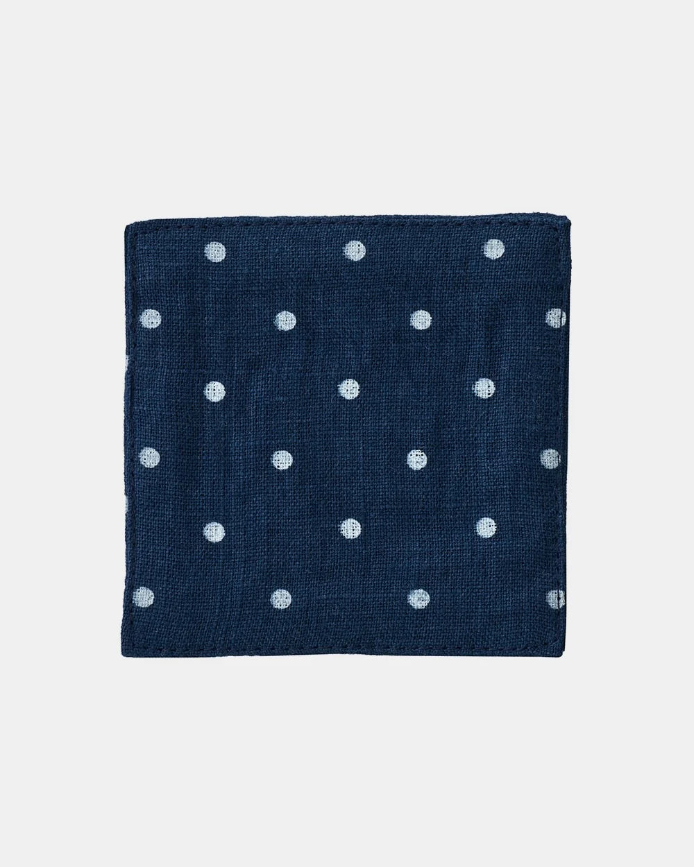 Fog Linen Coaster Navy Polka Dot on a white background 