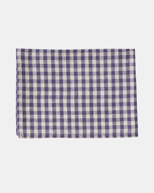 Gingham tea towe in cream and purple colours on a whte background 