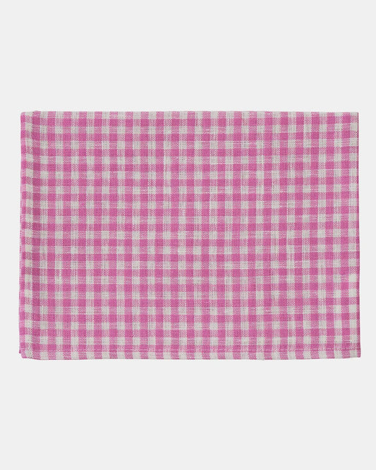 Pink and white checkered fabric on a white background