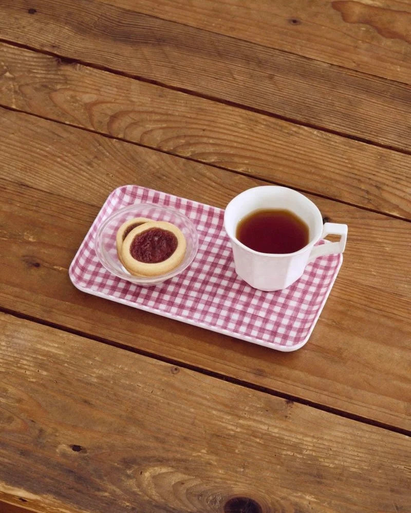 Fog Linen Tray Robin in pink and whte gingham on a brown wood panel