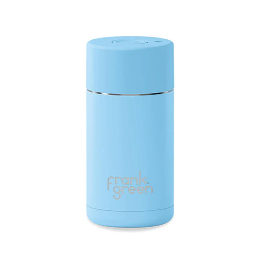 Light blue reusable coffee cup with 'frank green' branding on a white background