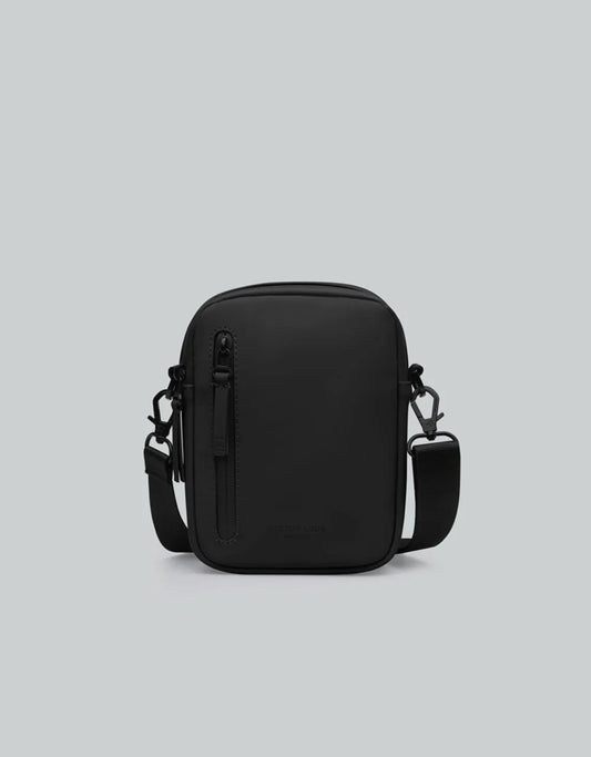 Gaston Luga Dash Verti Crossbody Bag in Black on a white background 
