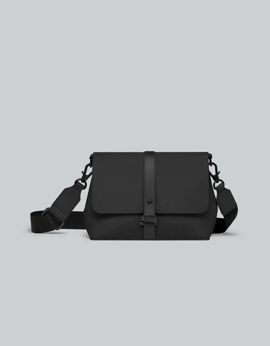 Black waterproof crossbody bag on a grey background 