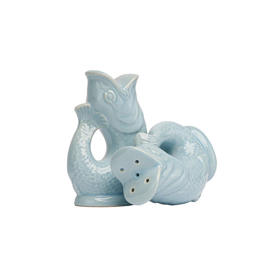 Ceramic salt and pepper shakers shaped like fish on a white background