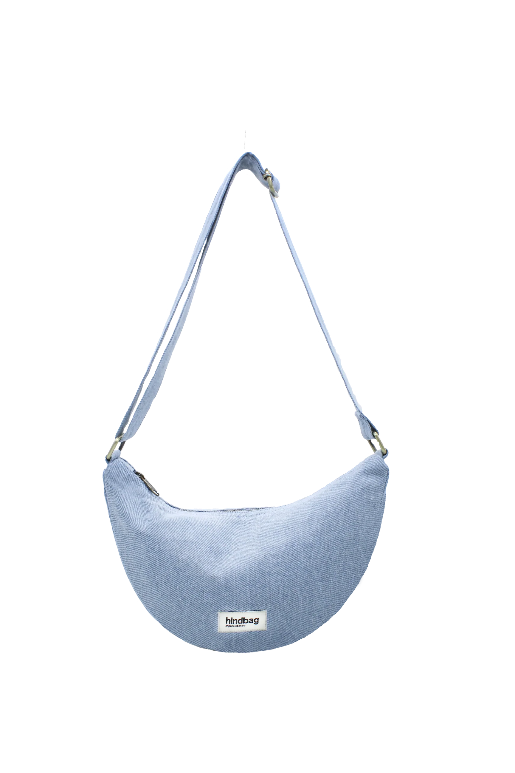 Blue denim crossbody bag on a white background