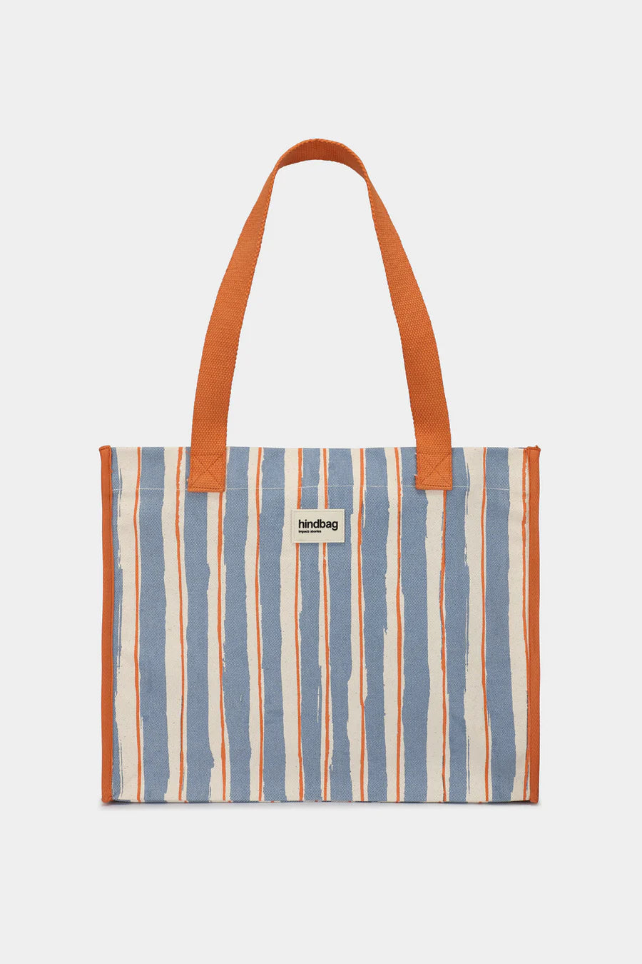 Striped tote bag with orange handle on a white background