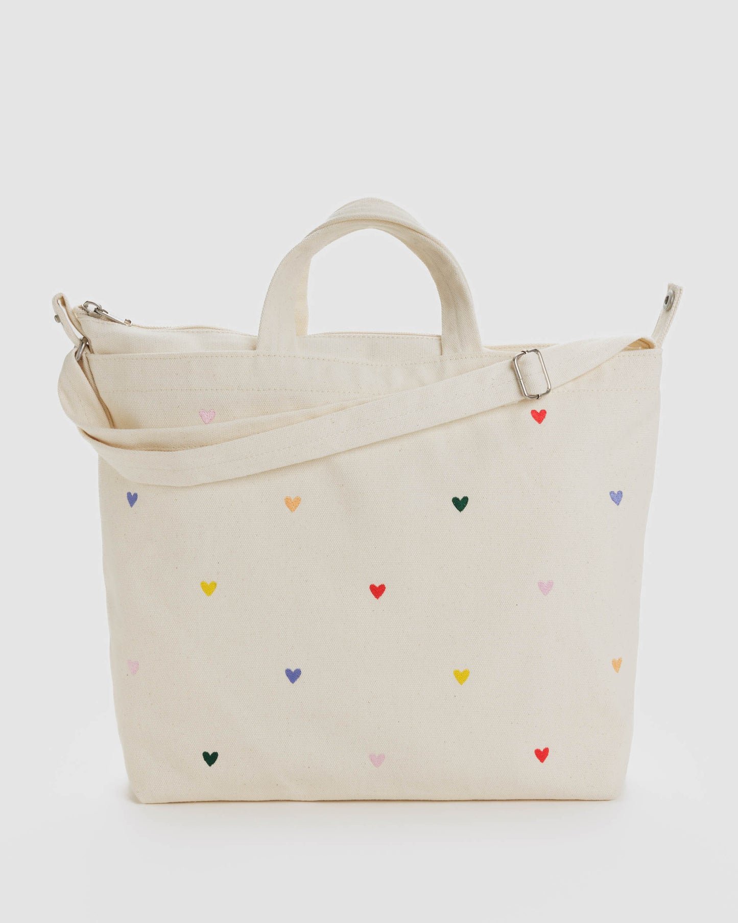 baggu horizontal zip duck bag in embroidered hearts 
