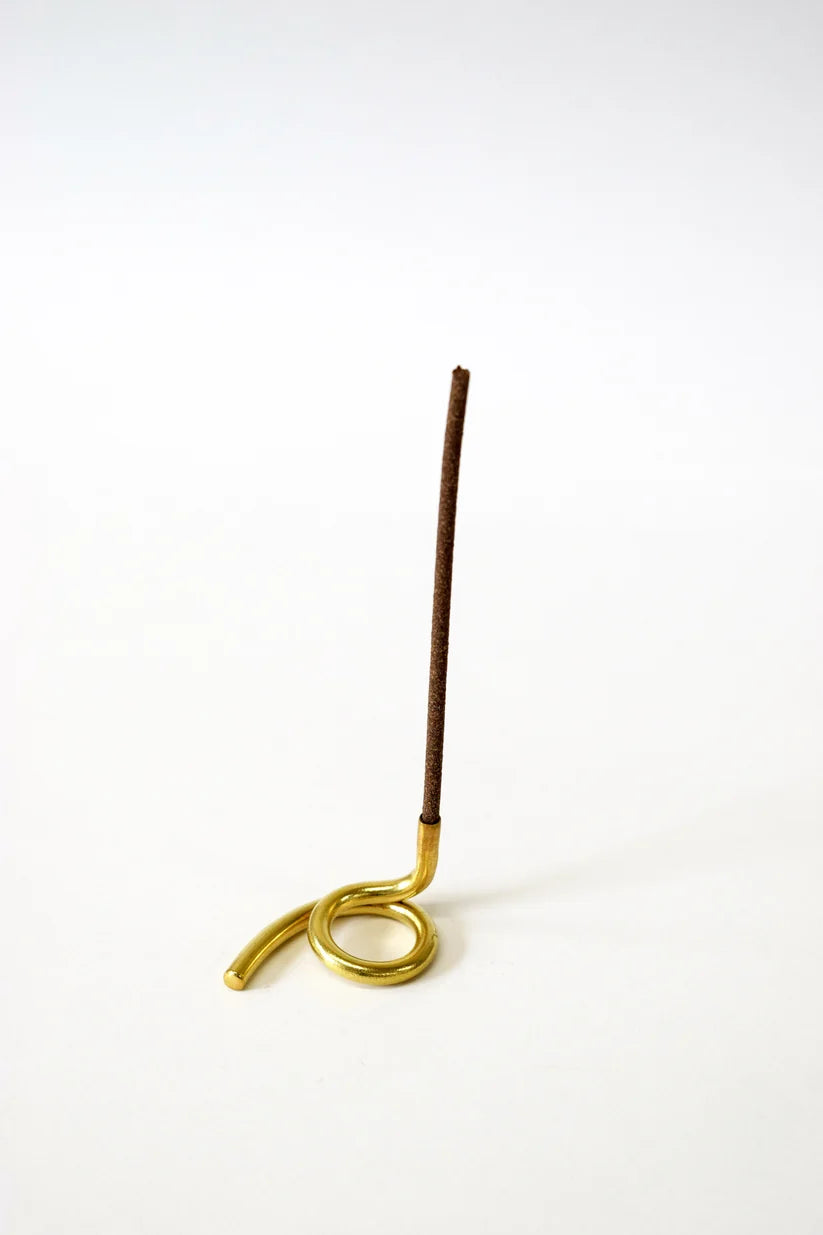 Incense Stick Holder Brass Casts on a white background 