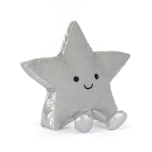 A silver glittery star-shaped plush pillow with a cute embroidered face, sitting on a white background.