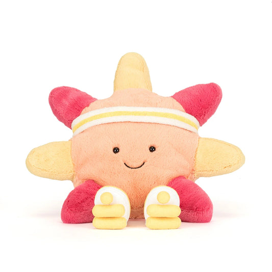 Plush toy sun with a yellow and pink design on a white background