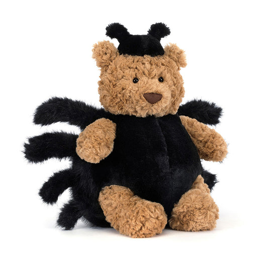 Plush toy bear in a black spider costume on a white background