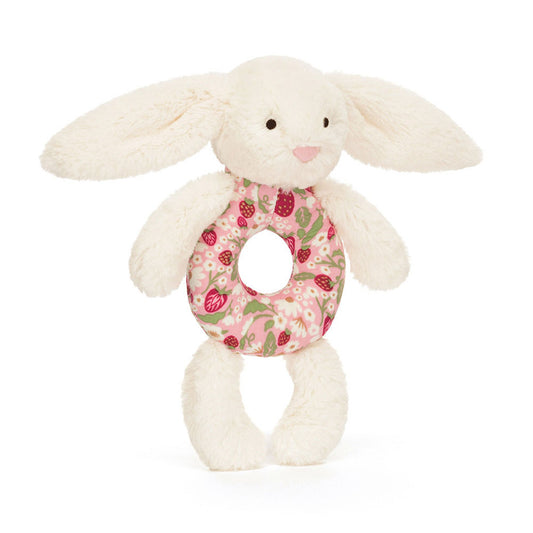 Plush bunny toy with a floral ring on a white background
