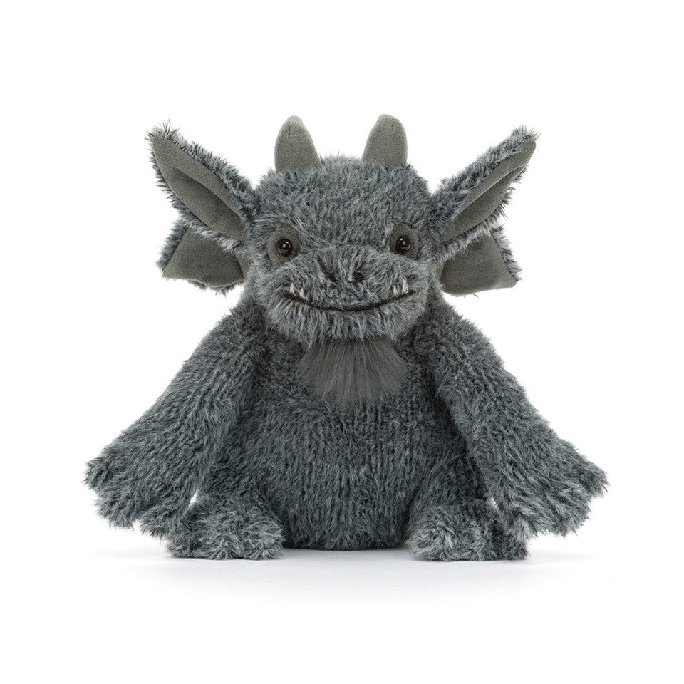 A plush gray dragon toy with large pointed ears, small horns, and a soft furry texture, centered on a clean white background.