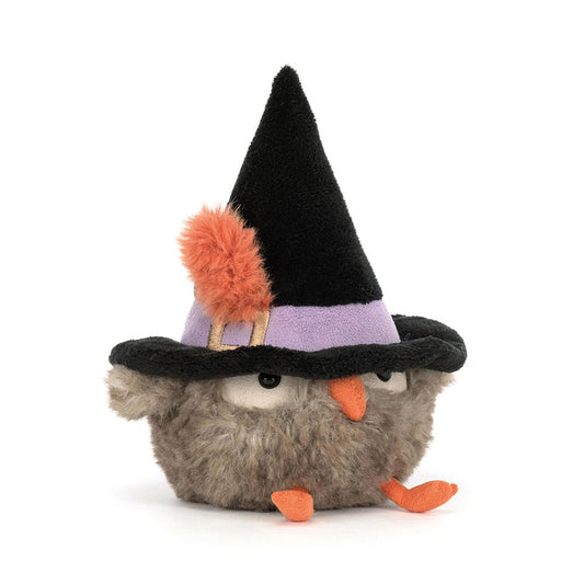 Plush toy resembling a creature with a witch hat on a white background