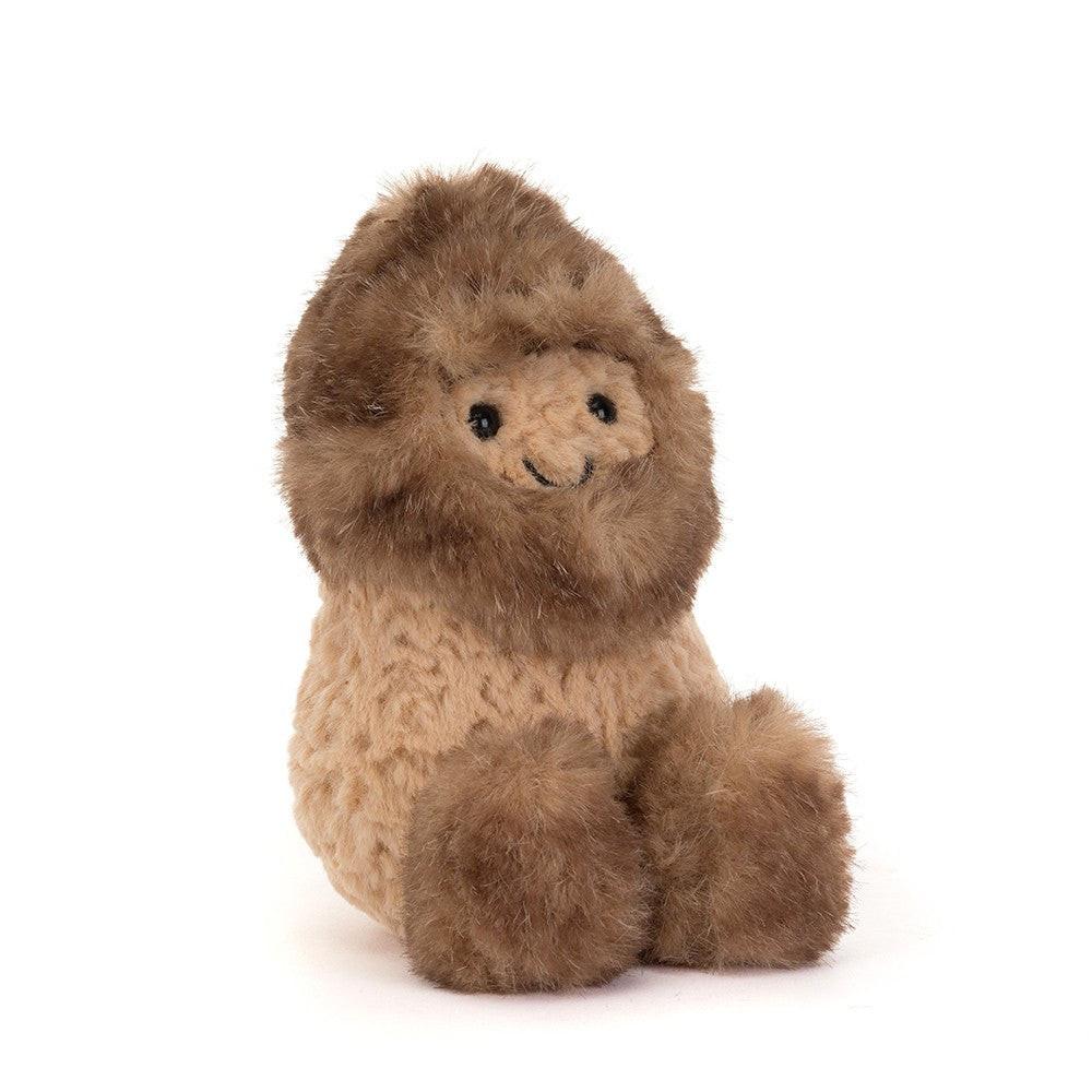 Plush Peanut Toy dressed as a fluffy yeti on a white background 