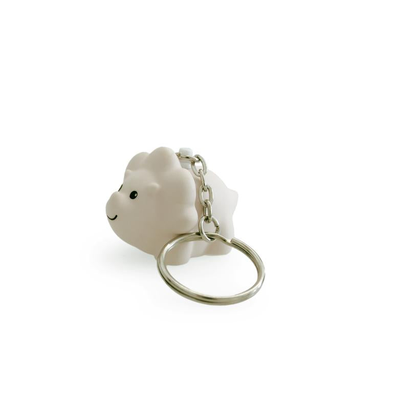 White sheep-shaped keychain on a white background
