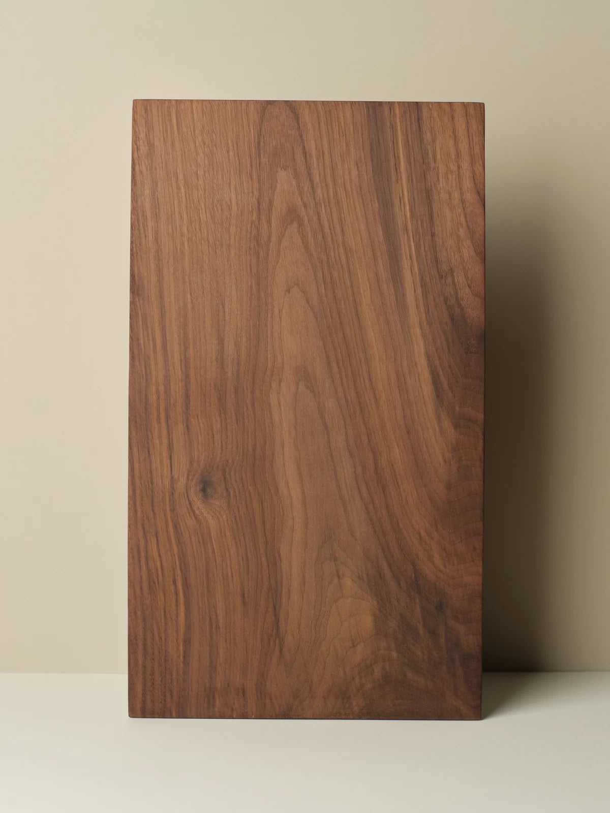 KATTO Cheese Board in deep brown colour on a beige background 