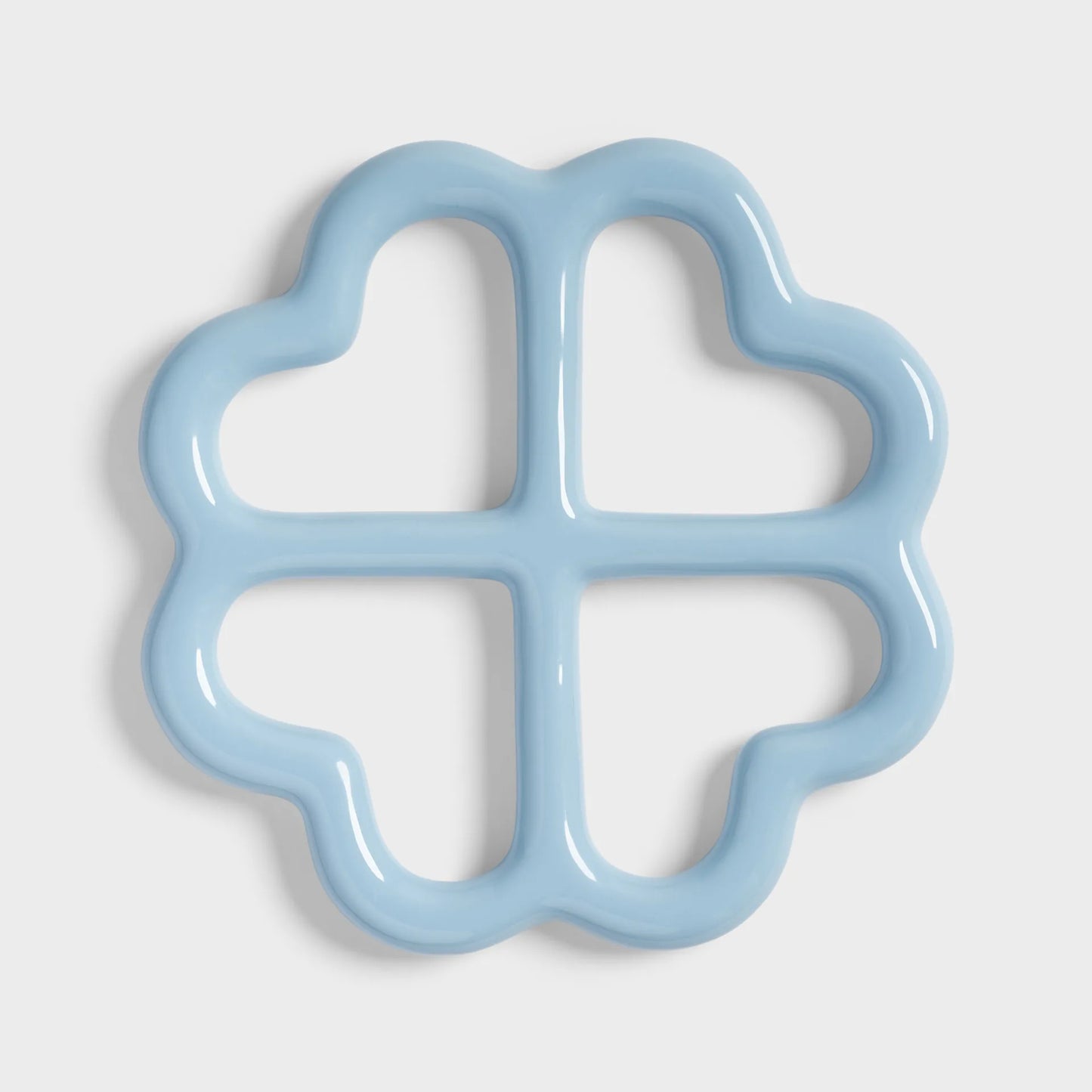 Light blue flower-shaped object on a white background