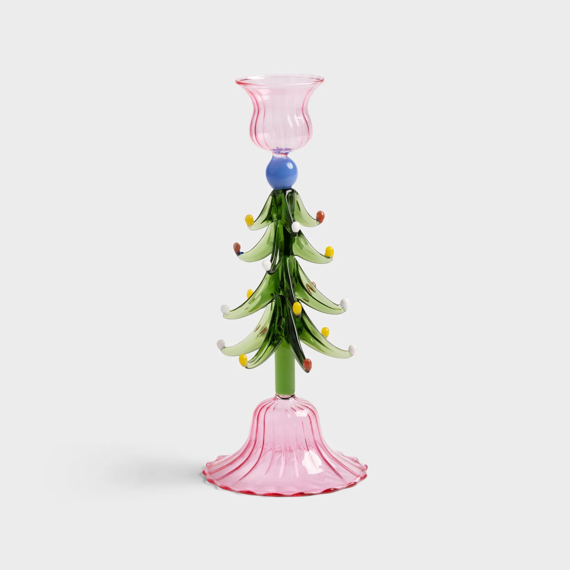 Glass Christmas tree with pink base and top on a white background